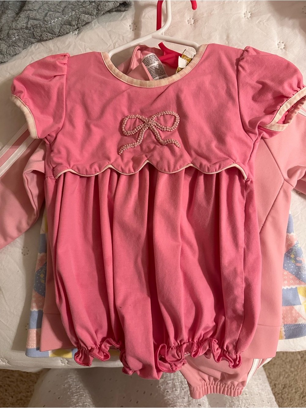 Pink Bubble Hem Baby Top with Bow Accent